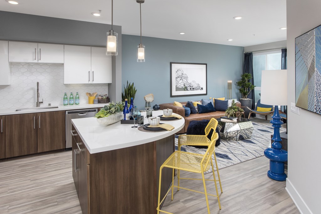 a kitchen and living room in a model home